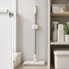 Roller-Grip Self-Adhesive Wall Mop & Broom Holder